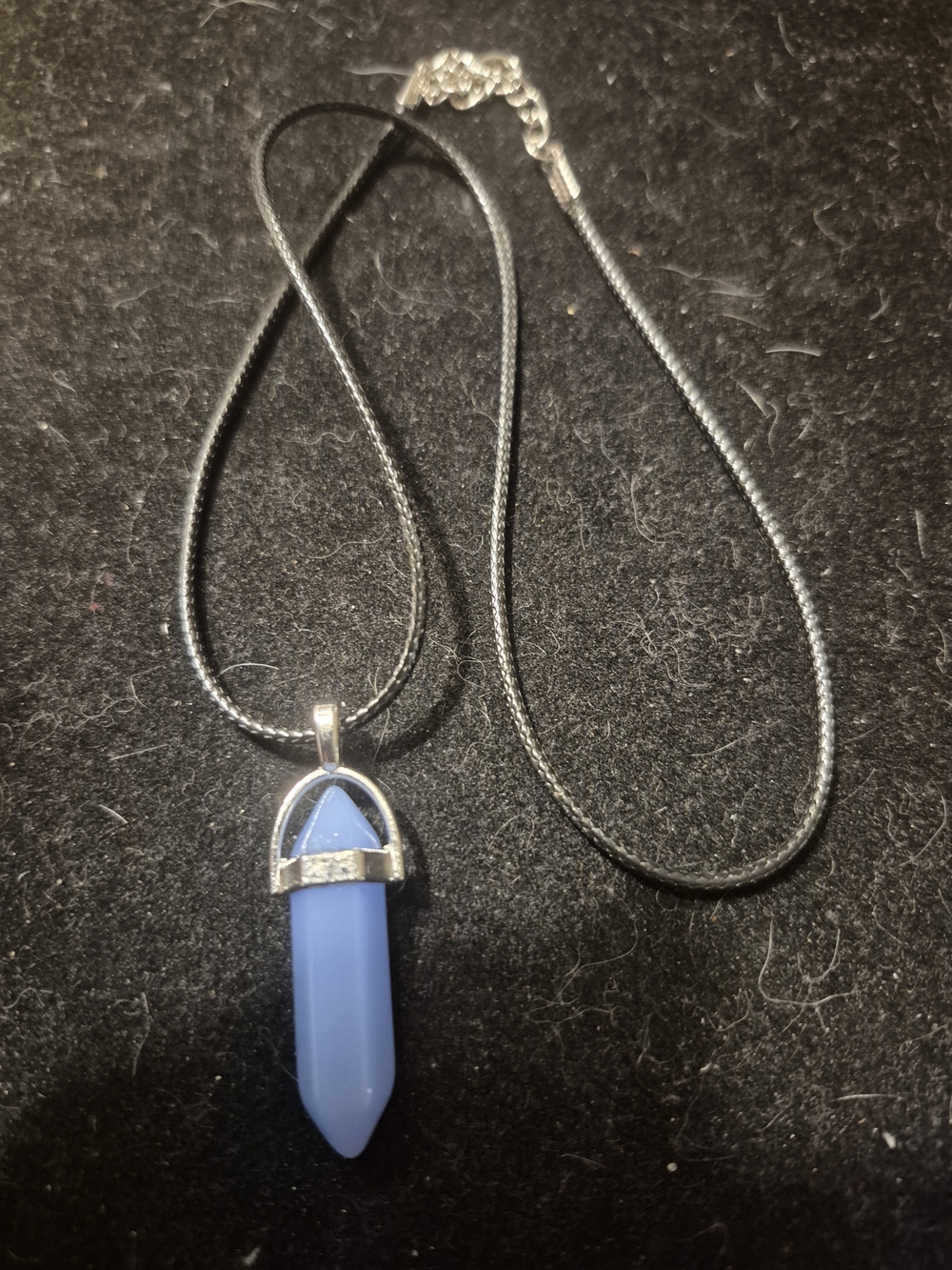 Blue Crystal Point Pendant Necklace on Black Cord
